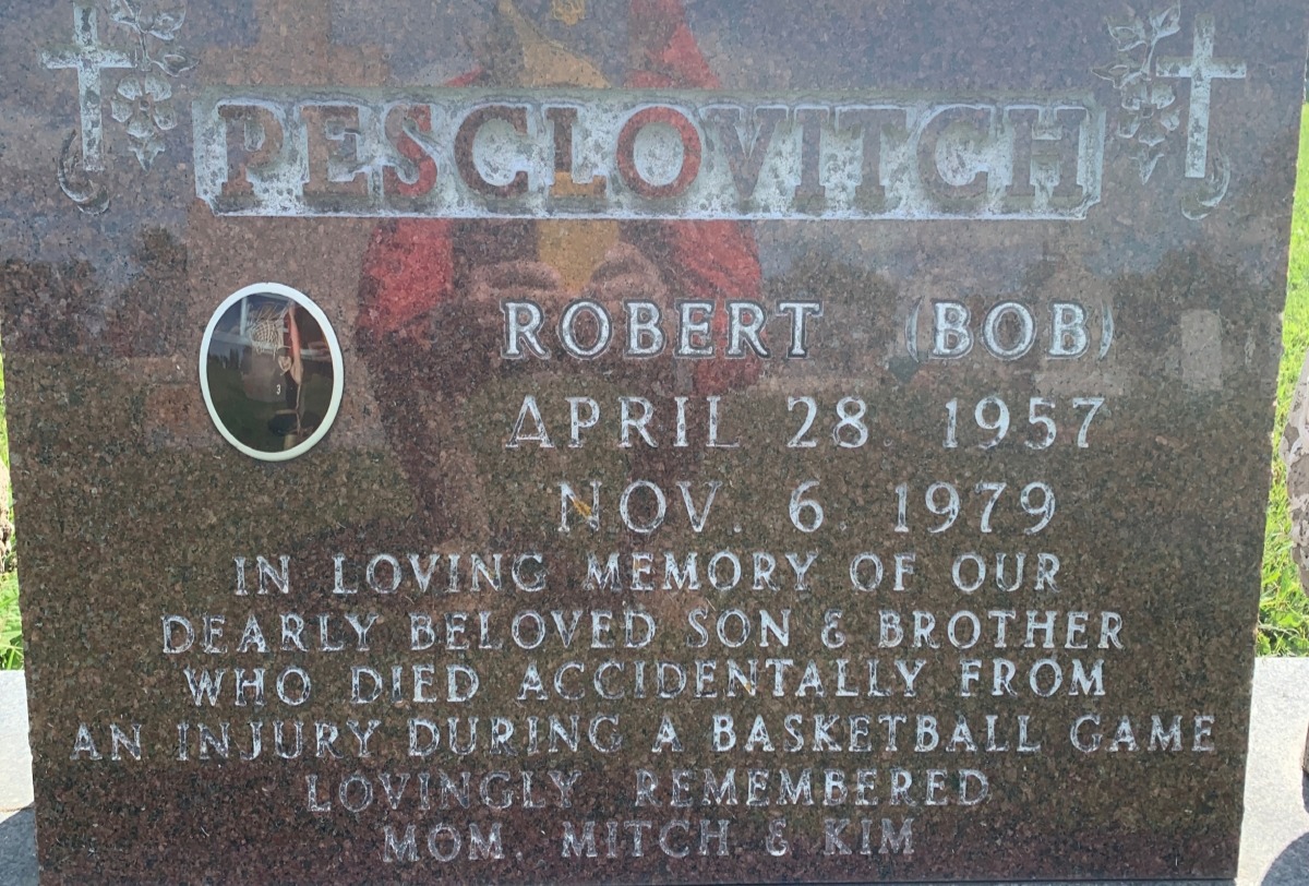 Death: picture of a gravestone for one of the author's high school basketball teammates