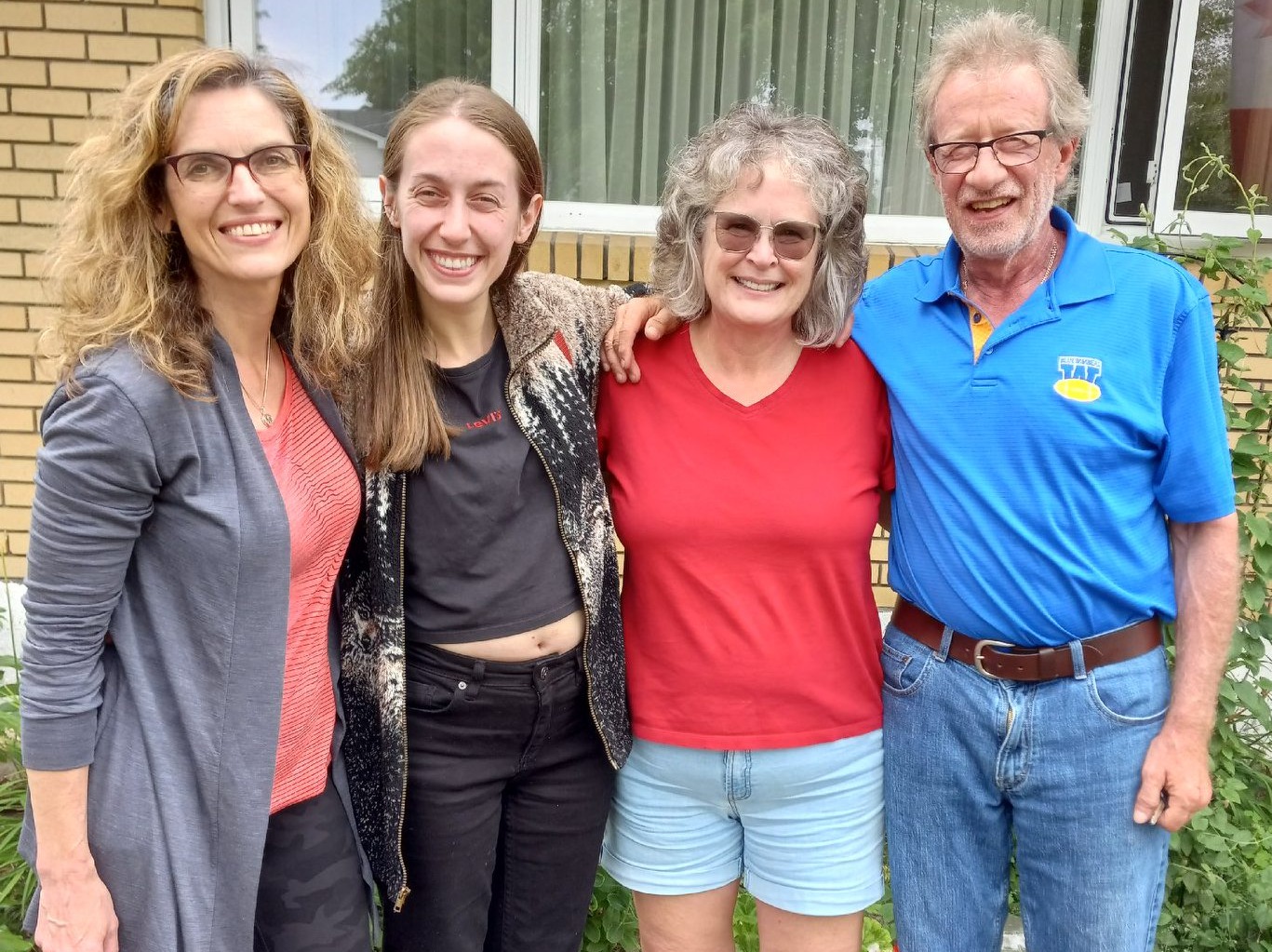 Divorce: author's ex-wife, daughter, current wife, and author all standing arm-in-arm