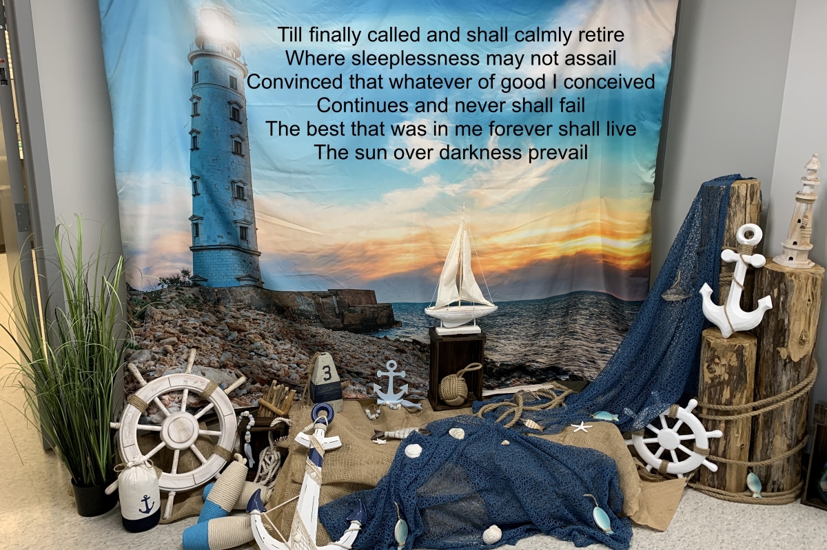 Good: nautical items and backdrop with some verse superimposed