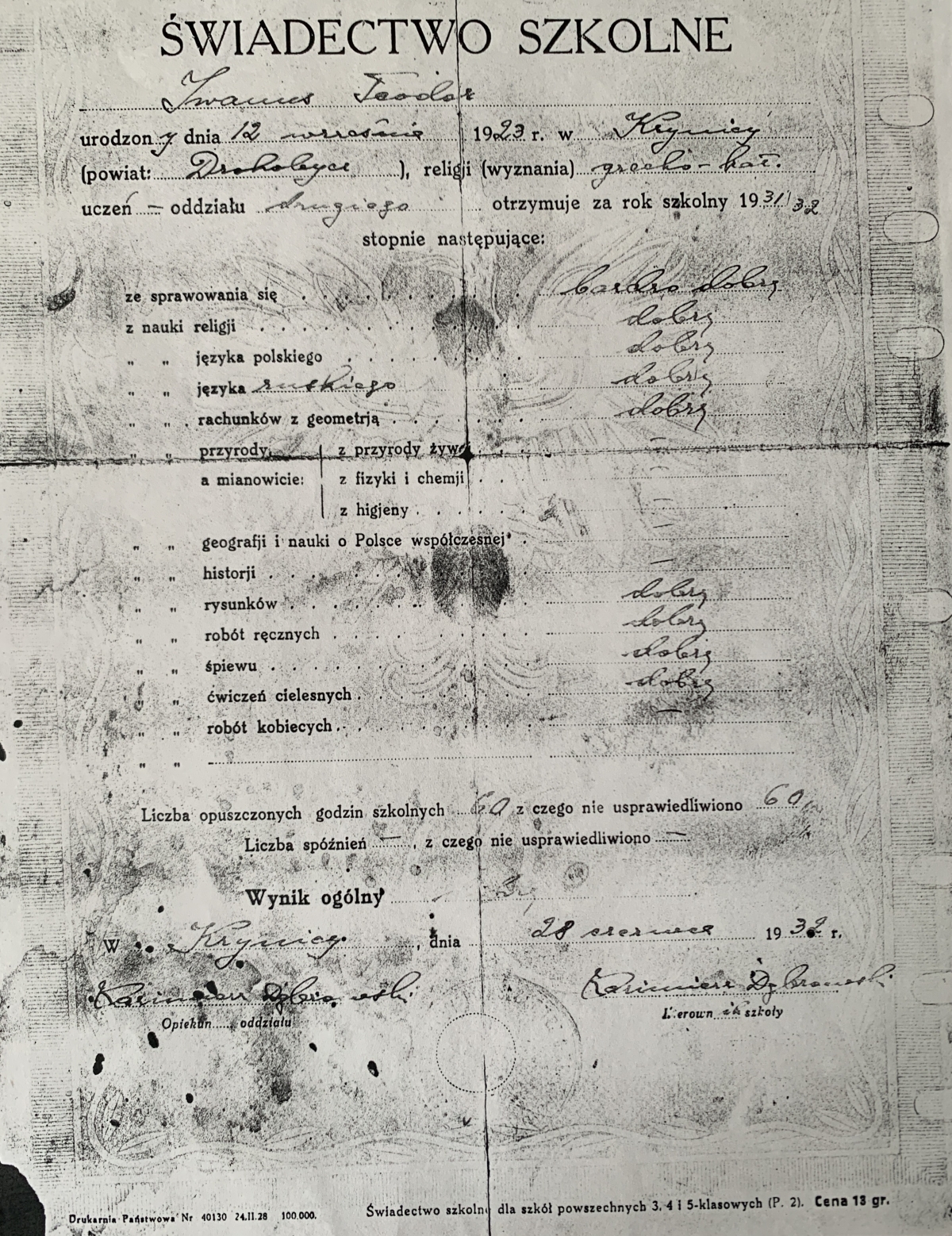 A report card from 1931-32, written in Polish