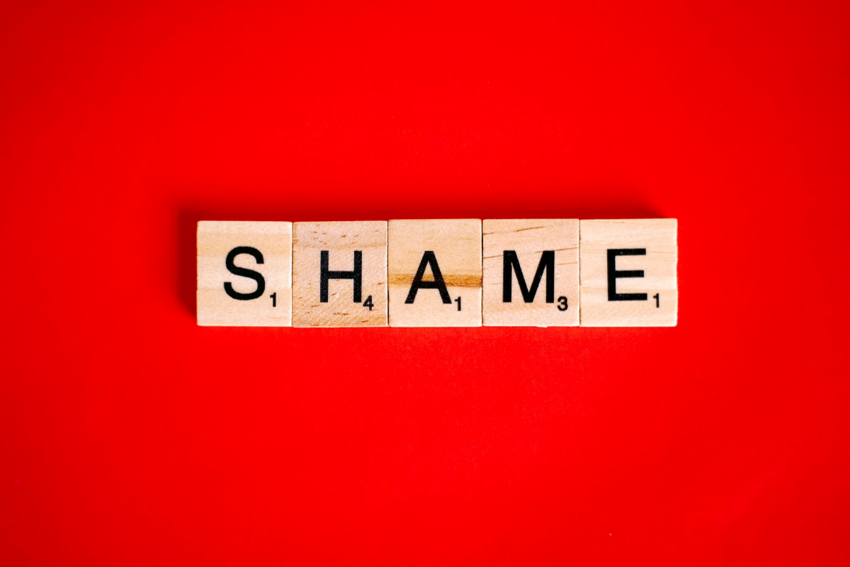 shame - the word "shame" on Scrabble tiles
